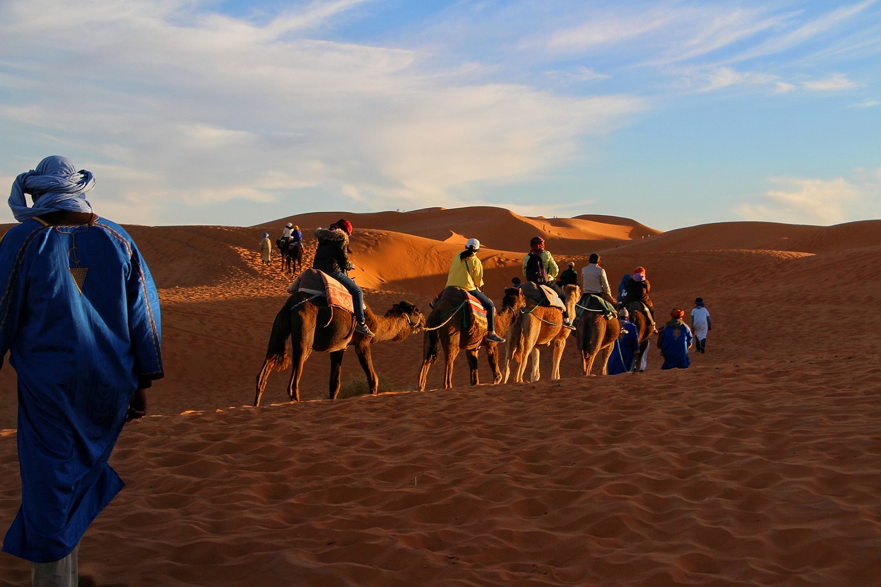 People riding camel | Top 10 Reasons to Visit Morocco